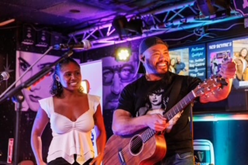 Ray Castro and Tania Allen performing